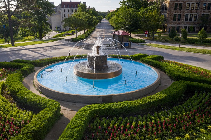 The Chi Omega Fountain in spring on the KU campus